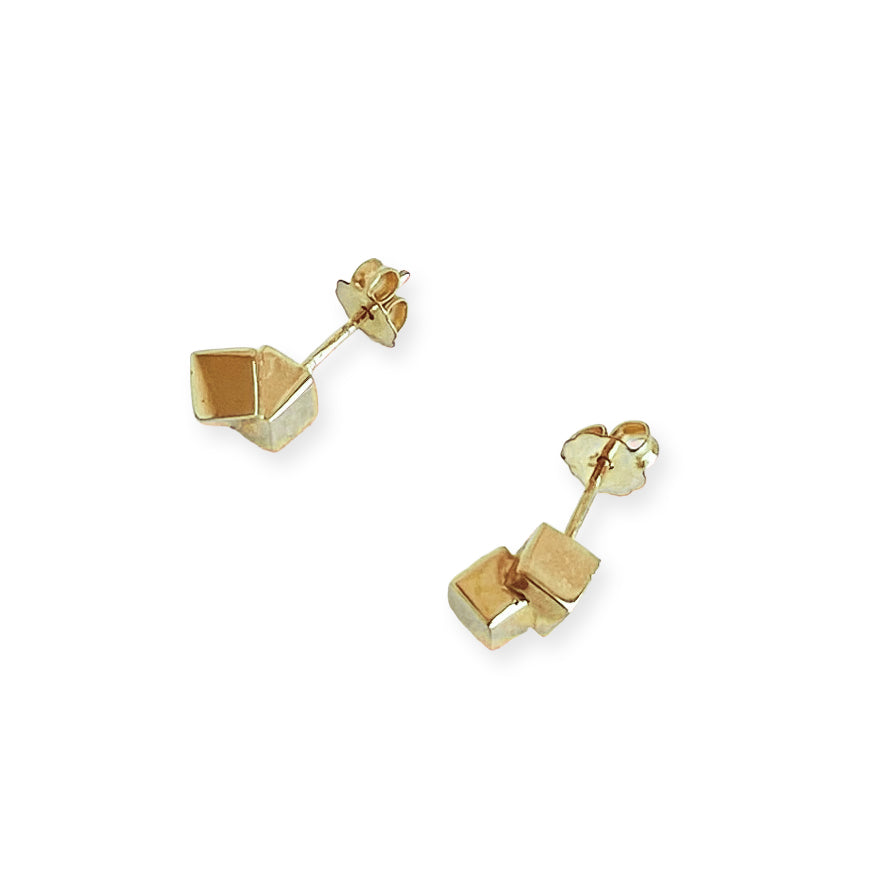 A pair of gold geometric stud earrings with an interlocking cube design, shown on a plain white background.