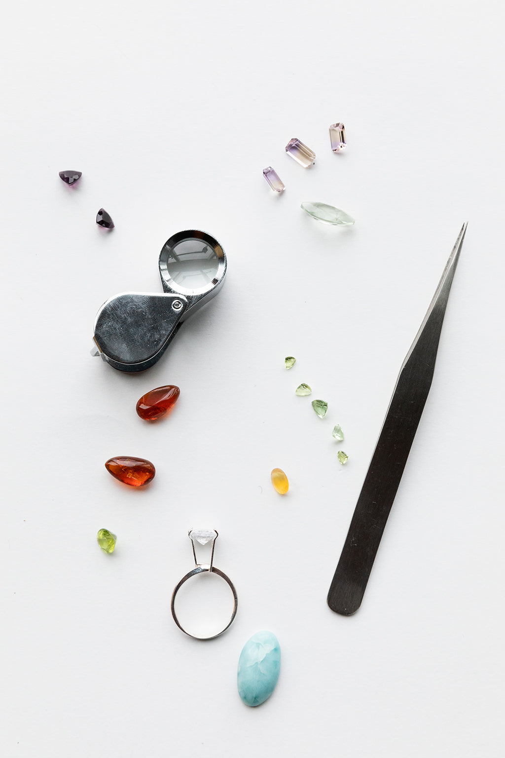 Gemstones and loupe