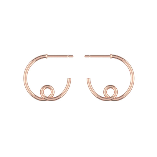 Large 14k rose gold loopy hoop earrings on a white background