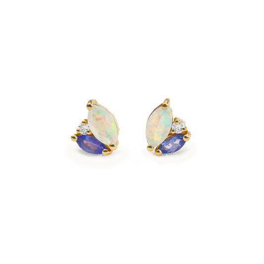 Pair of earrings with opal and tanzanite gemstones accented by diamonds on a white background